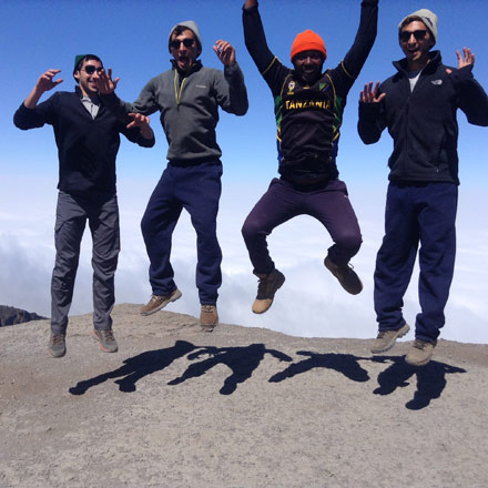 hikers jumping for joy
